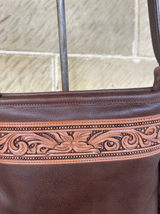 Walnut crossbody fringe bag with unique floral carving