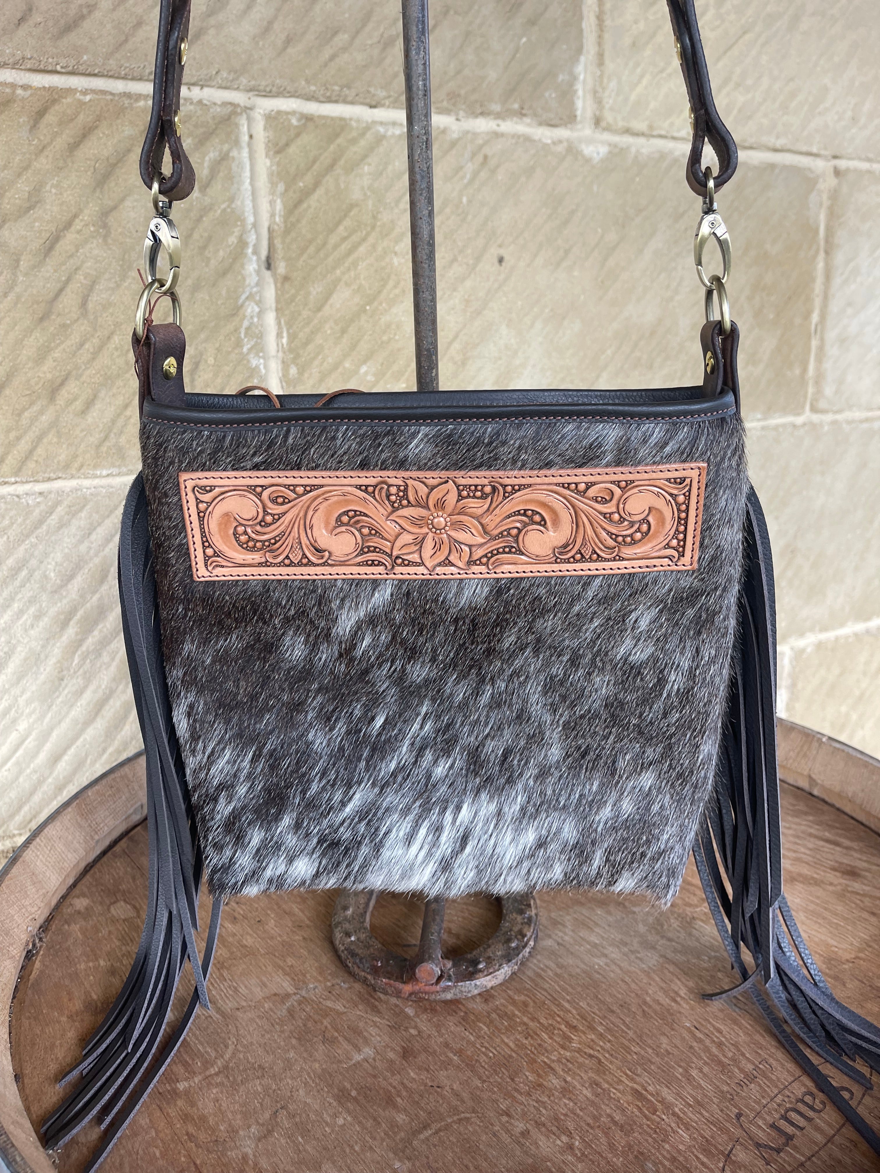Cowhide crossbody fringe bag with unique floral carving