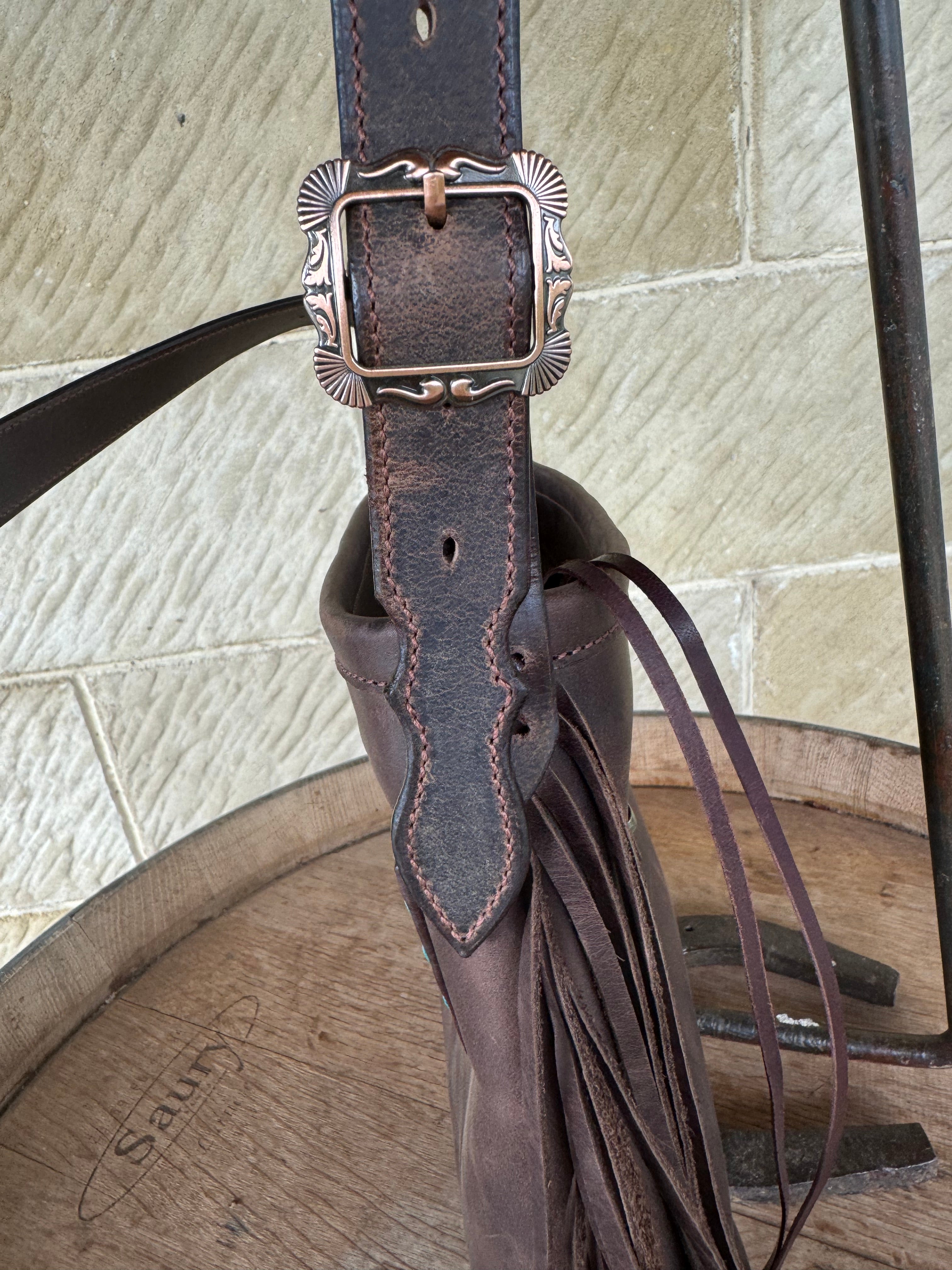 RUSTIC BLOOM CROSSBODY FRINGE BAG with unique floral carving